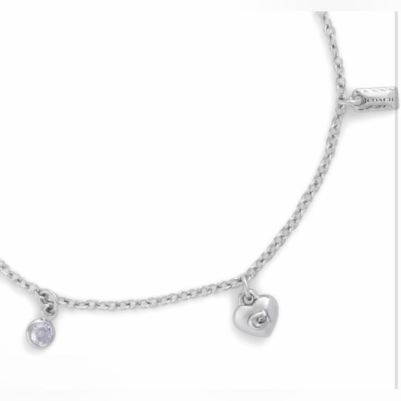 Coach New NWT silver tone chain charm bracelet featuring multiple charms - Picture 5 of 5